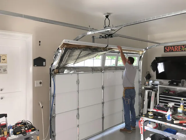 Garage door section replacement by Deerfield Beach Garage Door Repair in Deerfield Beach