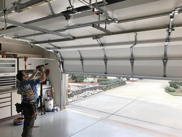 Garage door track repair service by Deerfield Beach Garage Door Repair in Deerfield Beach